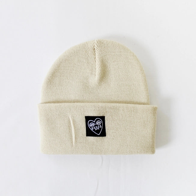 Crying Heart Cuffed Beanie Hat in Sand