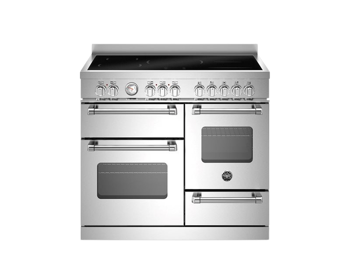 Stainless steel kitchen range with dual ovens on a white background