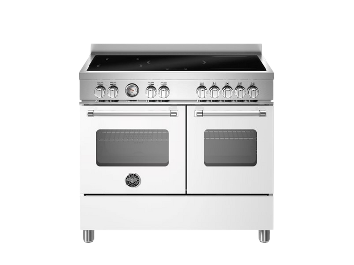 Stainless steel kitchen range with double oven and induction cooktop on a white background