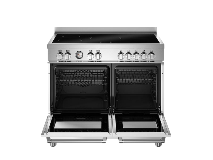 Stainless steel kitchen range with open doors on a white background