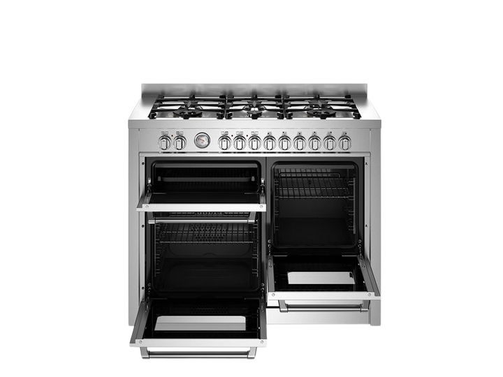 Stainless steel kitchen range with open oven doors on a white background