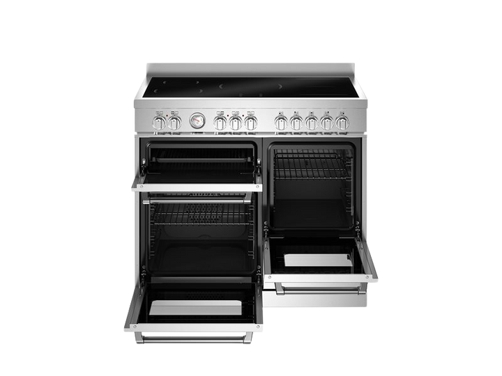 Stainless steel kitchen range with open doors on a white background