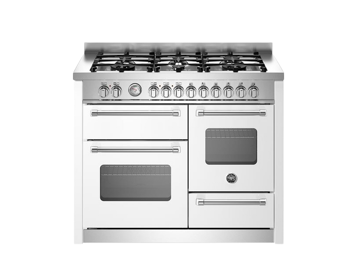 Stainless steel kitchen range with gas cooktop on a white background