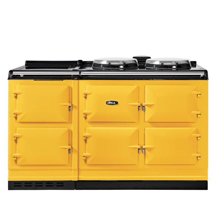 Yellow AGA stove with black cooktop on a white background
