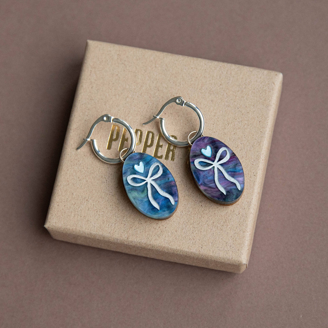 Oval Bow Charm Hoop Earrings in Mermaid & Silver