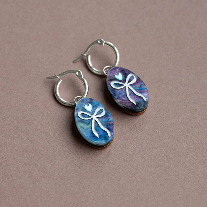 Oval Bow Charm Hoop Earrings in Mermaid & Silver