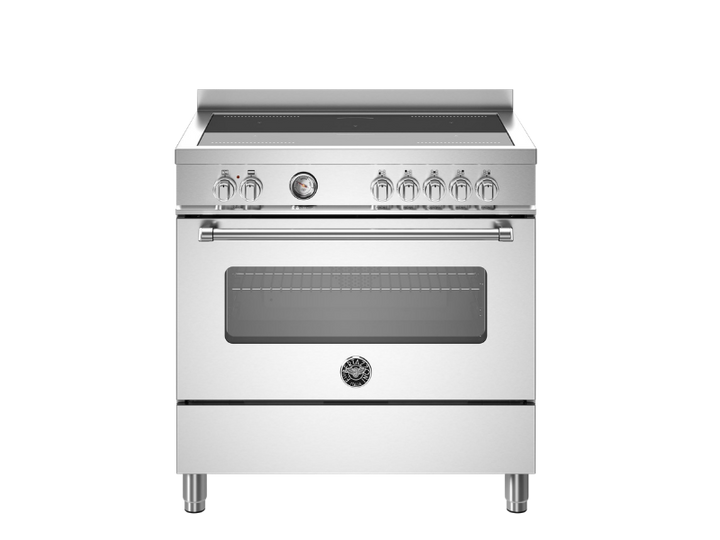 A silver Bertazzoni electric oven with induction top and triple-glass doors.