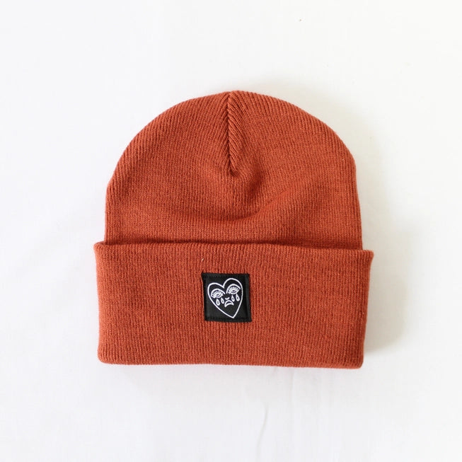 Crying Heart Cuffed Beanie Hat in Rust