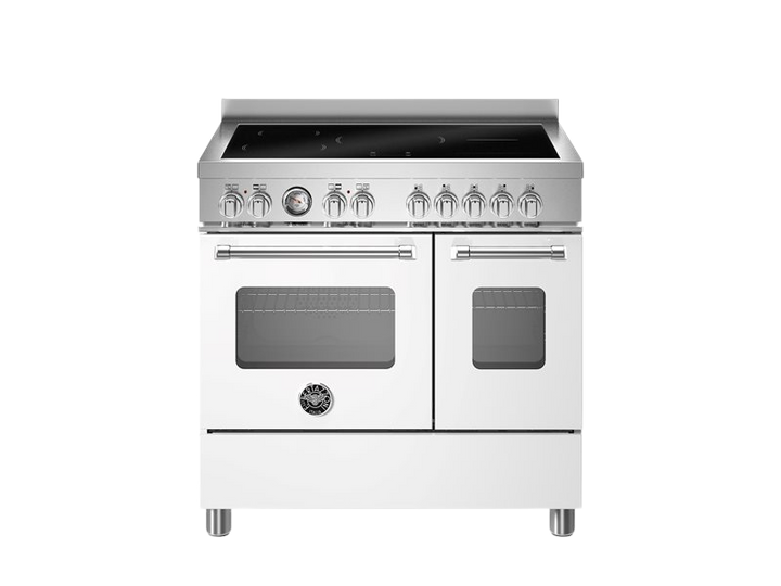 Stainless steel kitchen stove with induction cooktop on a white background