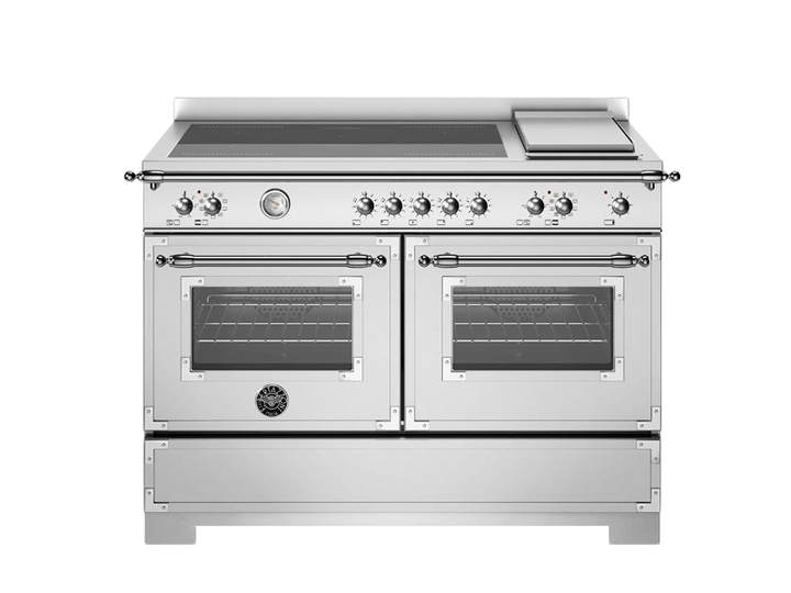 Stainless steel kitchen range with dual ovens and stovetop on a white background