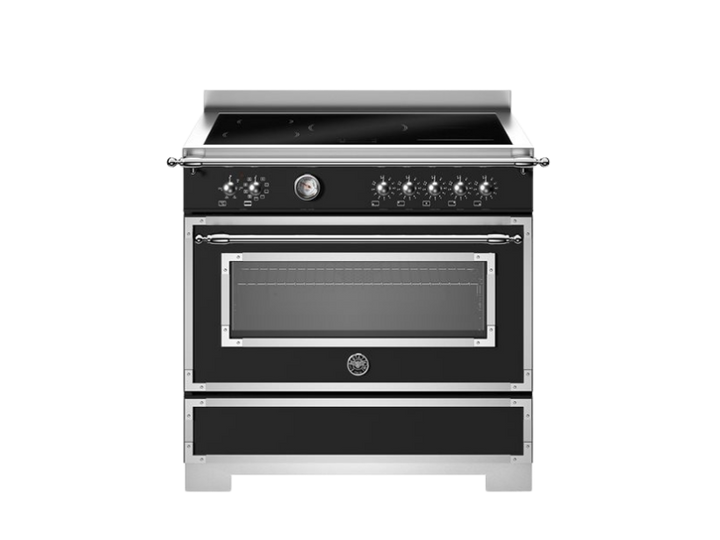Stainless steel oven with black glass door on a white background