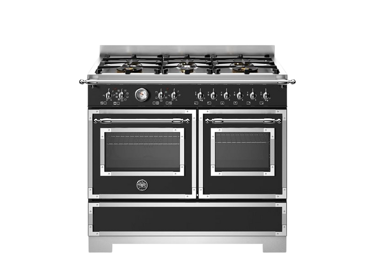Stainless steel range with gas cooktop on a white background