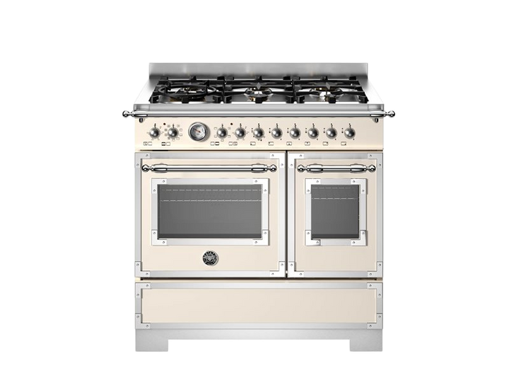 cream kitchen stove with gas burners on a white background