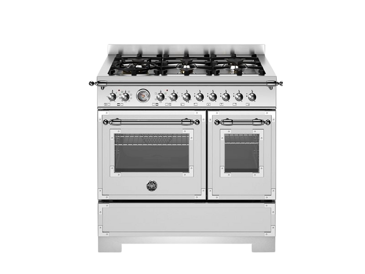 stainless steel gas stove with four burners and two ovens on a white background