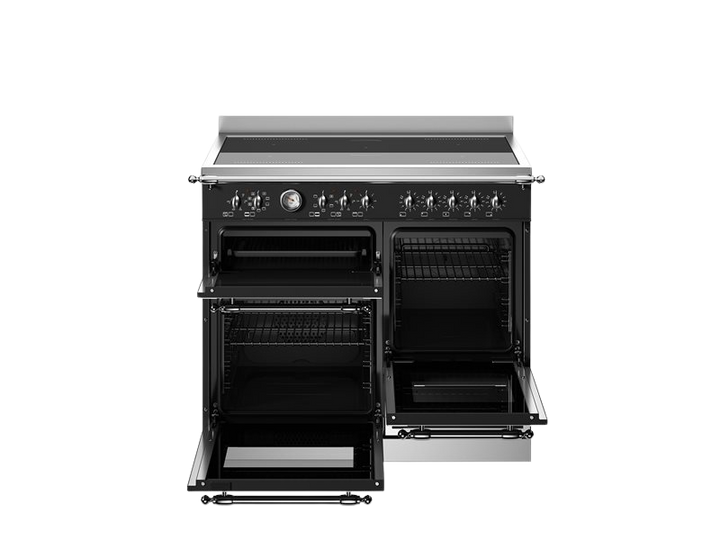 Stainless steel kitchen range with open oven and grill on a white background
