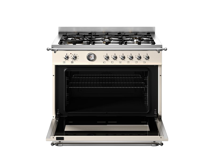 Stainless steel gas range with open oven door on a white background