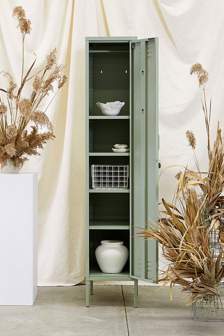 Mustard Made The Skinny Locker in sage with objects inside and in-between foliage